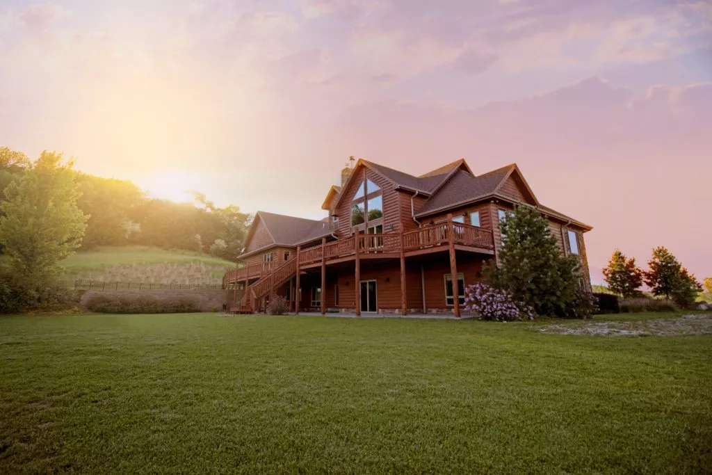house surrounded with fine grass