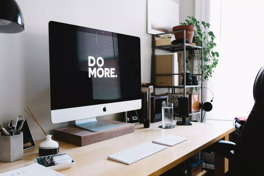 computer screen with do more sign on it