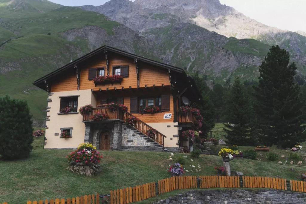house on the mountain with plenty of flowers